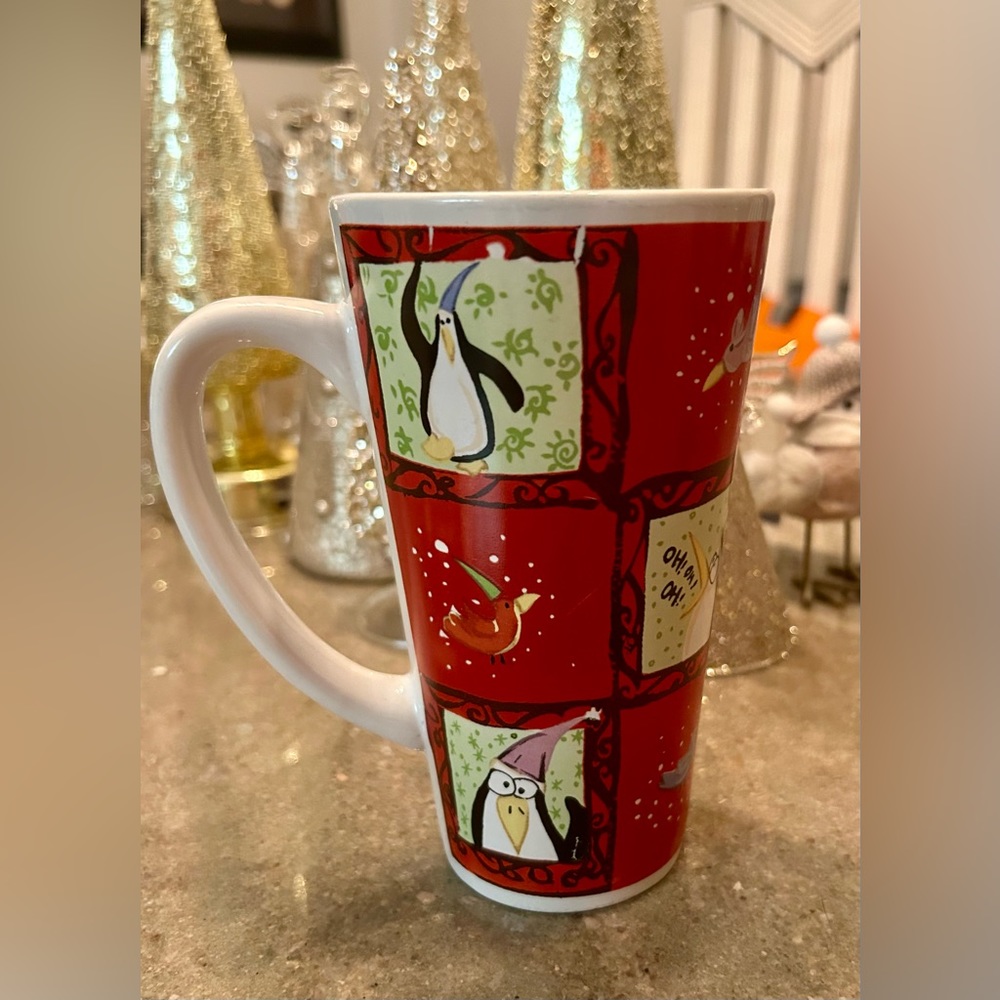 Tall super cute penguin mug.